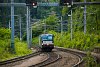 The Wiener Lokalbahnen AG's MRCE-Dispolok X 4 E - 605 Siemens Vectron is seen passing through the freight train through track of Payerbach-Reichenau station