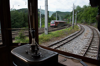 The Hllentalbahn TW 1 seen at Payerbach-Reichenau - the photo shows a railjet train bound for Vienna (Wien Hauptbahnhof) from the driver's cab of the narrow-gauge railcar