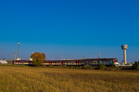 A ŽSSK class 560 <q>Pantograf</q> trainset is leaving Levice station