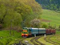 The UZ ChME3 5723 seen hauling a mixed passenger-freight train at Старжава