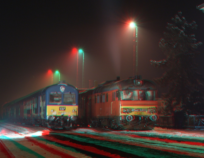 The MDmot 3003 and the BDt 137 at Balmazjvros station in an anaglyph 3D photo photo