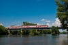 An unidentified ŽSSK 263  seen between Šal'a and Trnovec nad Vhom on the bridge of the Vh river