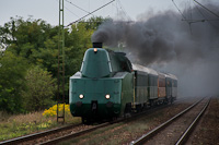 The MV Nosztalgia kft. 242,001  seen between llő and Hosszberek-Pteri