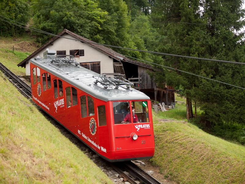 The Pilatusbahn (PB) Bhe 1/2 23 seen between Aemsigen and Alpnachstad photo