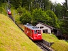 The Pilatusbahn (PB) Bhe 1/2 22 seen between Aemsigen and Alpnachstad