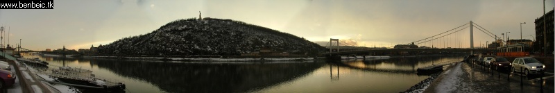 The panoramic view of Gellrt hegy with a tram o the right photo