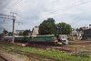 The ChME3-3357 (?) (ЧМЭ3-3357) at Ternopil depot with a 2M62 section and two DR1A trailers