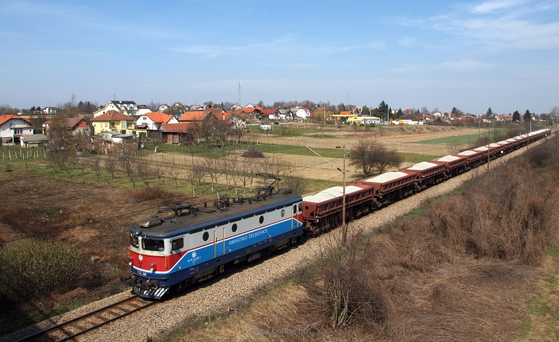 The HŽ 1141 381-2 is hauling a freight train near Kapronca (Koprivnica, Croatia) photo