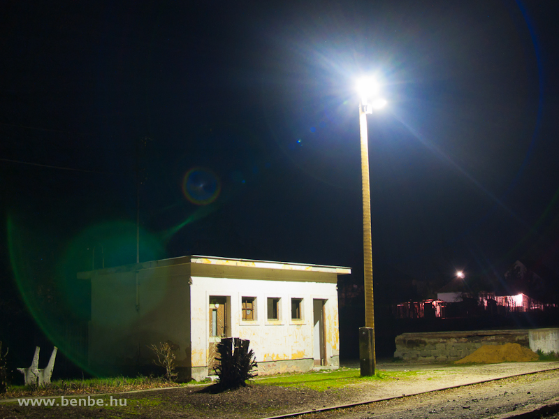 An illuminated warehouse at Acsa-Erdőkürt stop photo