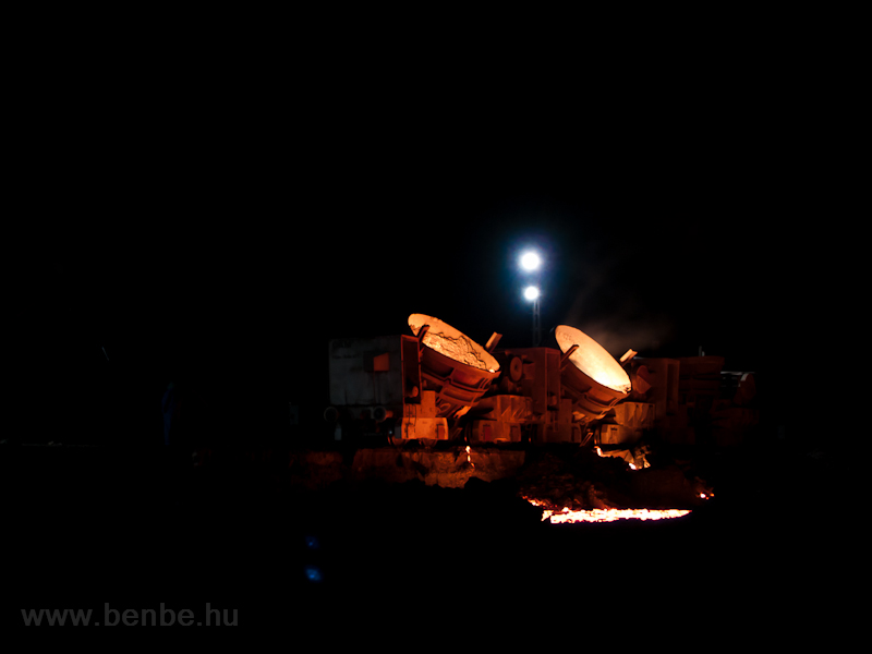 Emptying steel mill slag at photo