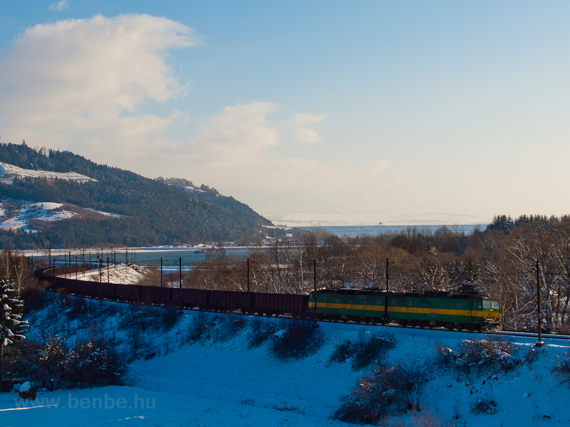 A freight train hauled by a photo