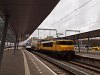The NS 1733 electric locomotive is seen pushing an old double-decker push-pull train at Utrecht Centraal