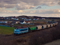 The MV 242 256-6 seen hauling a wheat train near sk