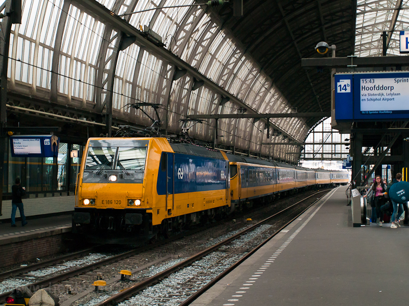 The NS E186 120 TRAXX seen in front of an InterCityDirect train heading for Breda at Amsterdam Centraal photo