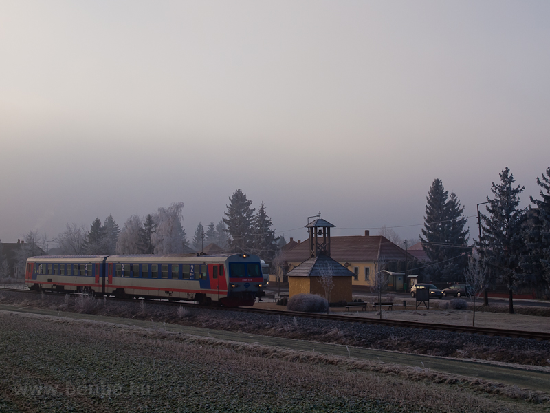 The GYSEV 2446 514 seen between Lukcshza als and Lukcshza at the bell tower photo