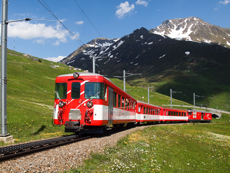 An MGB rack-and-pinion push-pull train with a class Deh 4/4 I railcar seen between Andermatt and Ntschen on the Oberalppass photo