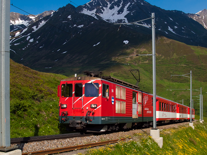 The MGB Deh 4/4 II 94 seen between Andermatt and Ntschen at Oberalppass photo