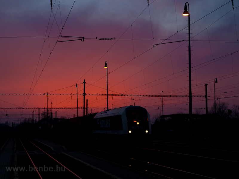 Metrans container freight train in the sunset at Komrom photo