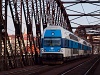 The ČD 971 068-2 CityElefnt seen as a Beroun-bounded Esko train between Praha-Vršovice and Praha-Šmchov in Najbrt livery