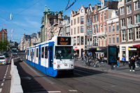 An old Amsterdam tram seen at Damrak, near Centraal Station