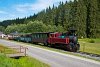 The Čiernohronsk Železnica 764 407 seen between Vydrovo Skanzen and Korytrske