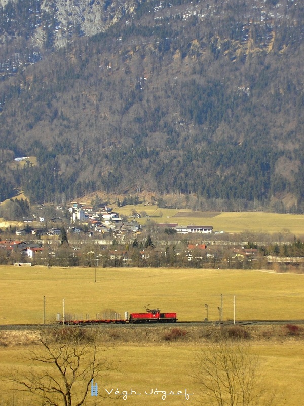 Small locomotive, giant mountains photo