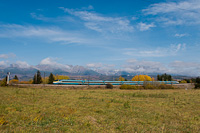 An unidentified ČD class 680 SuperCity Pendolino seen between Strba and Vazec with the High Tatras in the background