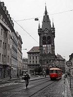 A Tatra T3 tram near the tower of Jindřišska Ves