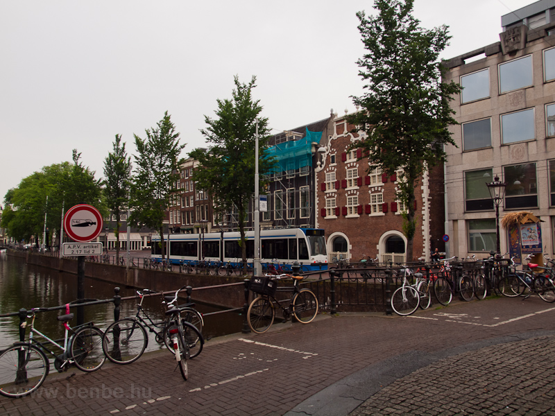 A GVB Combino seen at Amsterdam at the banks of Singel photo