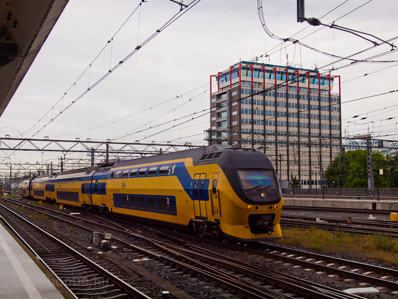 A VIRM trainset is seen arriving at Amsterdam Centraal photo