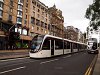 Villamos és modern emeletes busz Edinburghben