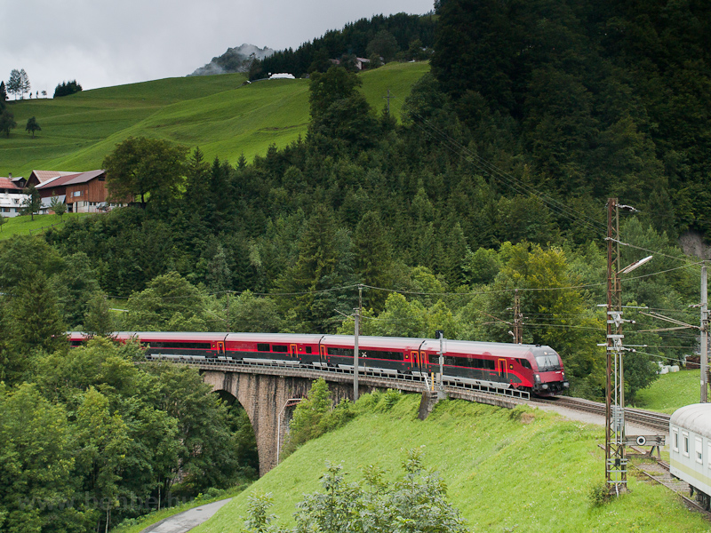 An BB railjet cab car seen between Hintergasse and Dalaas on Radonatobelbrcke photo