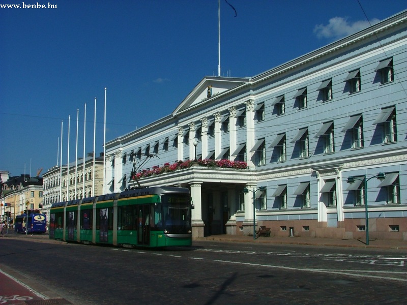 An AdTranz Variotram in front of the city hall of Helsinki at Market Square photo