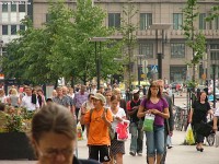 Thousands of passangers are walking towards their commuter trains on Eliel square