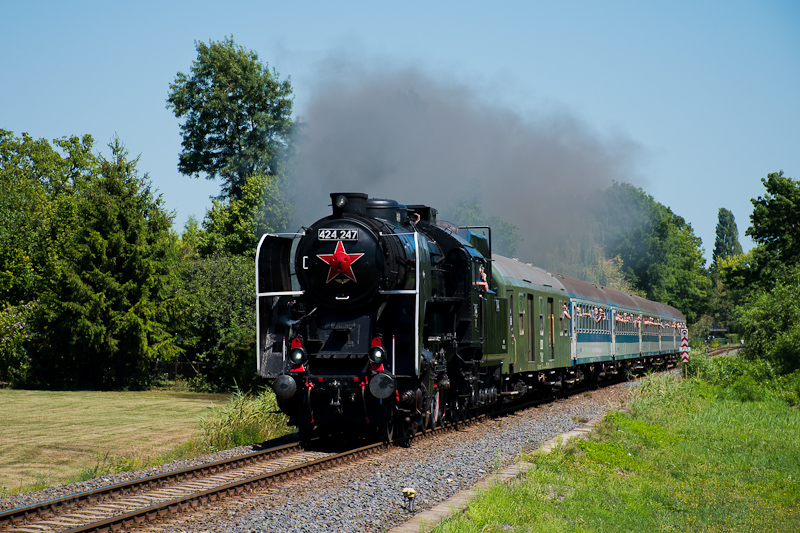 The MV-Nosztalgia kft. 424,247 steam locomotive seen between Balatonudvari and Fvenyes photo