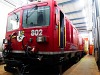The Gem 4/4 802 electro-diesel locomotive seen at Poschiavo