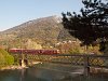 The RhB Be 4/4 514 is pushing an S-Bahn to Rhzns on the Hinterrhein-bridge by Reichenau-Tamins