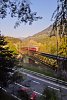 The RhB Be 4/4 514 is pushing an S-Bahn to Rhzns on the Hinterrhein-bridge by Reichenau-Tamins