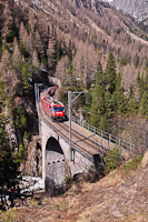 The Ge 4/4<sup>III</sup> 642 <q>RhB-Team</q> advertising livery locomotive on the Albula-IV viadukt between Muot and Preda