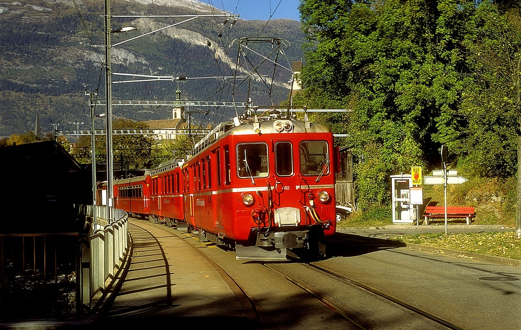 The RhB/ChA ABDe 4/4 482 and 488 DC electric railcars at the beginning of the Arosa-line by the Plessur river at Chur, 30/10/1997. photo