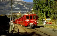 The RhB/ChA ABDe 4/4 482 and 488 DC electric railcars at the beginning of the Arosa-line by the Plessur river at Chur, 30/10/1997.