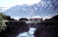 The RhB Ge 6/6<sup>I</sup> 415 hauls a freight train on the old Hinterrheinbrcke by Thusis on 08/01/1986