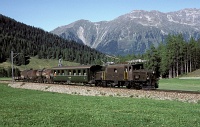 The Ge 6/6<sup>I</sup> 412 with a mixed freight-passenger train by Davos, 11/09/1985.