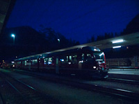 A Poschiavo-Landquart freight train with an Allegra at Pontresina