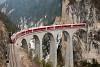 The Rhtische Bahn ABe 8/12 3514 seen between Filisur and Alvaneu on the Landwasser-Viadukt hauling an Alvra Albula-Gliderzug