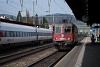 The SBB 620 025-7 (Re 6/6 025) seen at Liestal with an ICN tilt-chassis IC-train in the background
