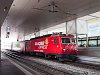 The MGB HGe 4/4<sup>II</sup> 106 is leaving Disentis/Mustr station with a Glacier-Express bound for Zermatt