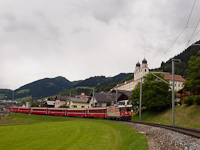 The Ge 4/4<sup>II</sup> 622 is leaving Disentis with a normal REX train