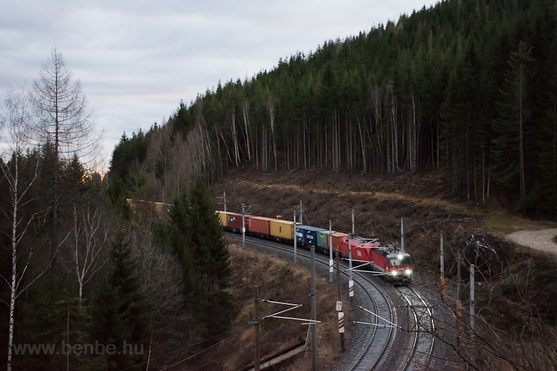 A freight train seen betwee photo