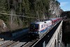 The BB Werbelok 1116 250 <q>Polizei-Lok</q> seen hauling a railjet between Breitenstein and Wolfsbergkogel on the Krausel Klause Viadukt